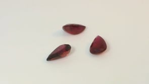 Ruby 5.5x4mm+/- Pear Shape Dark Red