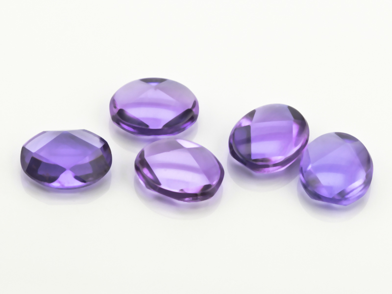 Synthetic/Lab Grown Sapphire 10x8mm Oval Buff Top Faceted Back Purple