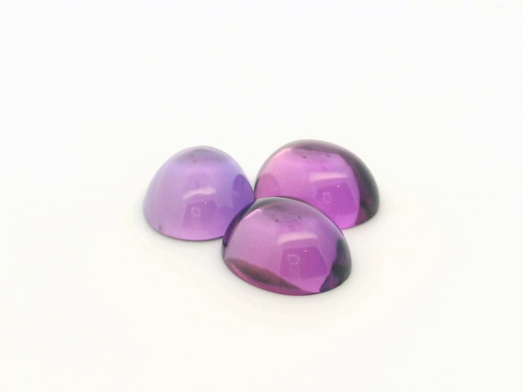 Synthetic/Lab Grown Sapphire 12x10mm Oval Cabochon German Cut Purple