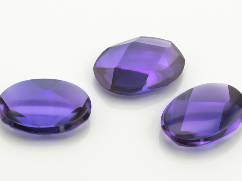 Synthetic/Lab Grown Sapphire 14x10mm Oval Buff Top Faceted Back German Cut Purple