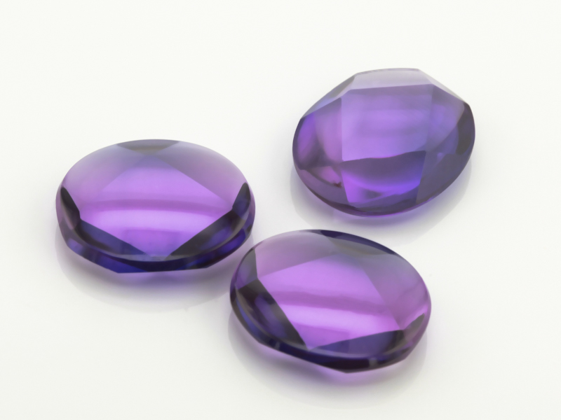 [YUVT1412P1] Synthetic/Lab Grown Sapphire 14x12mm Oval Buff Top Faceted Back German Cut Purple