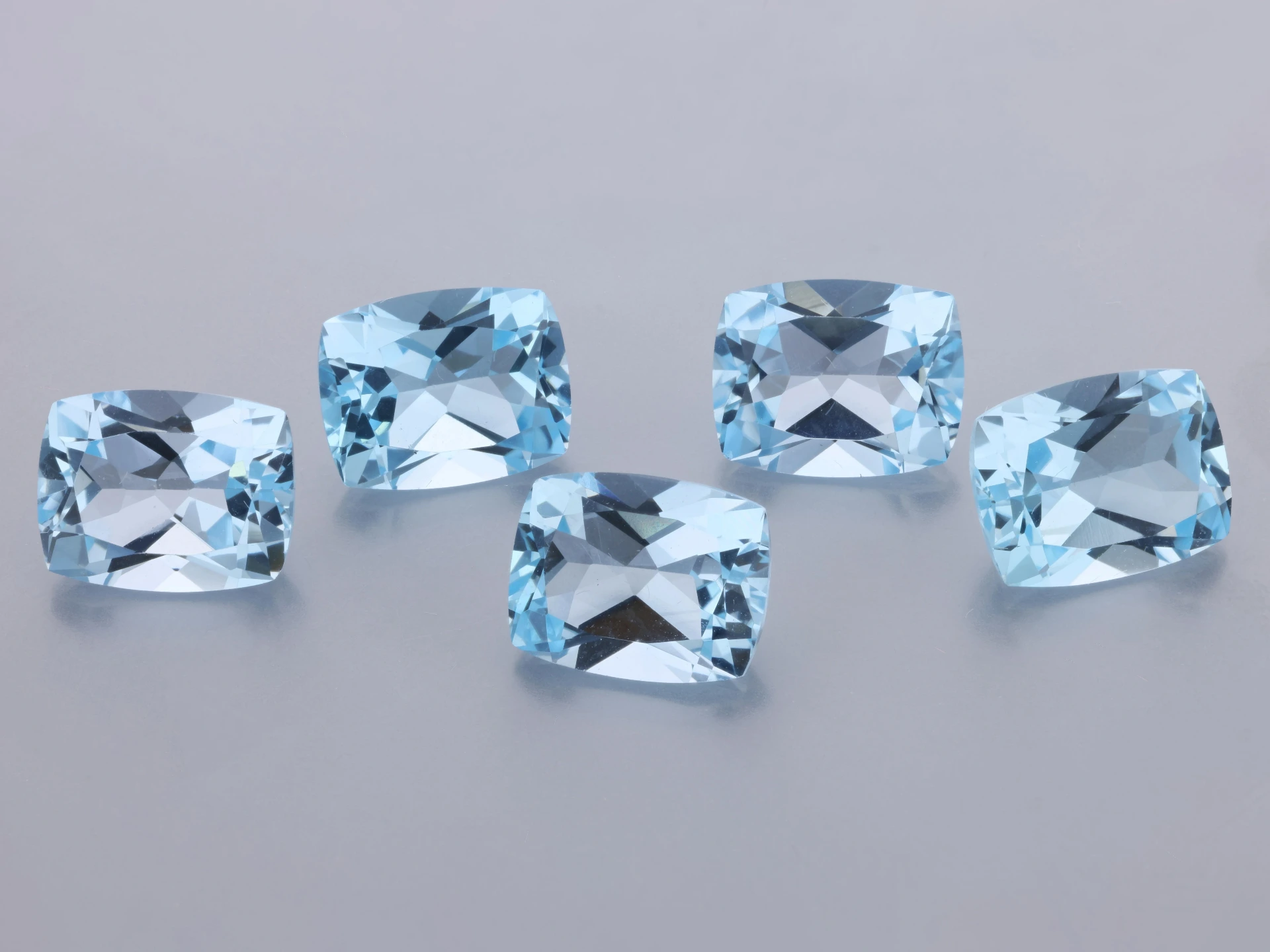 Topaz 9x7mm Cushion Light Blue
