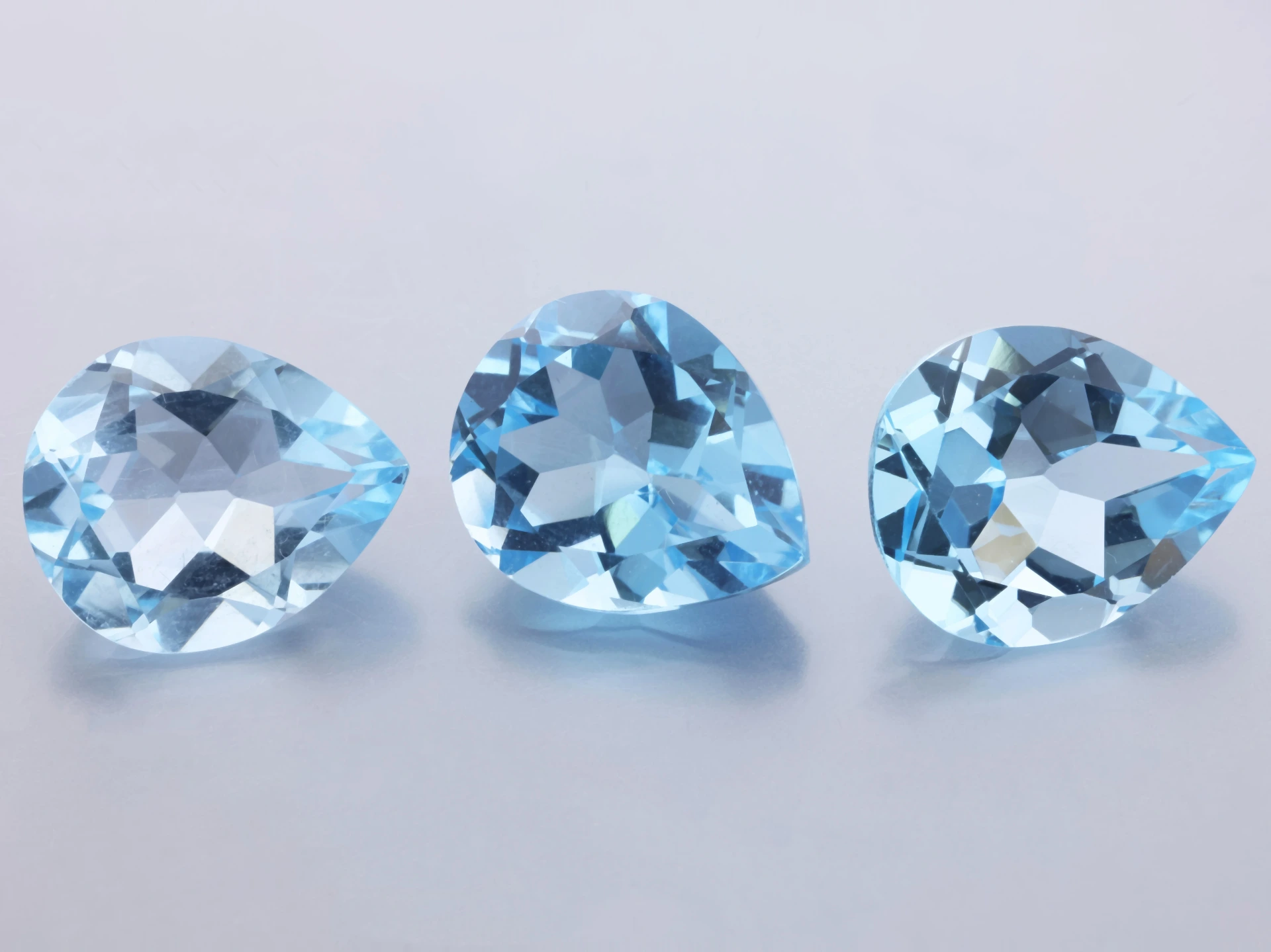 Topaz 12x10mm Pear Shape Light Blue