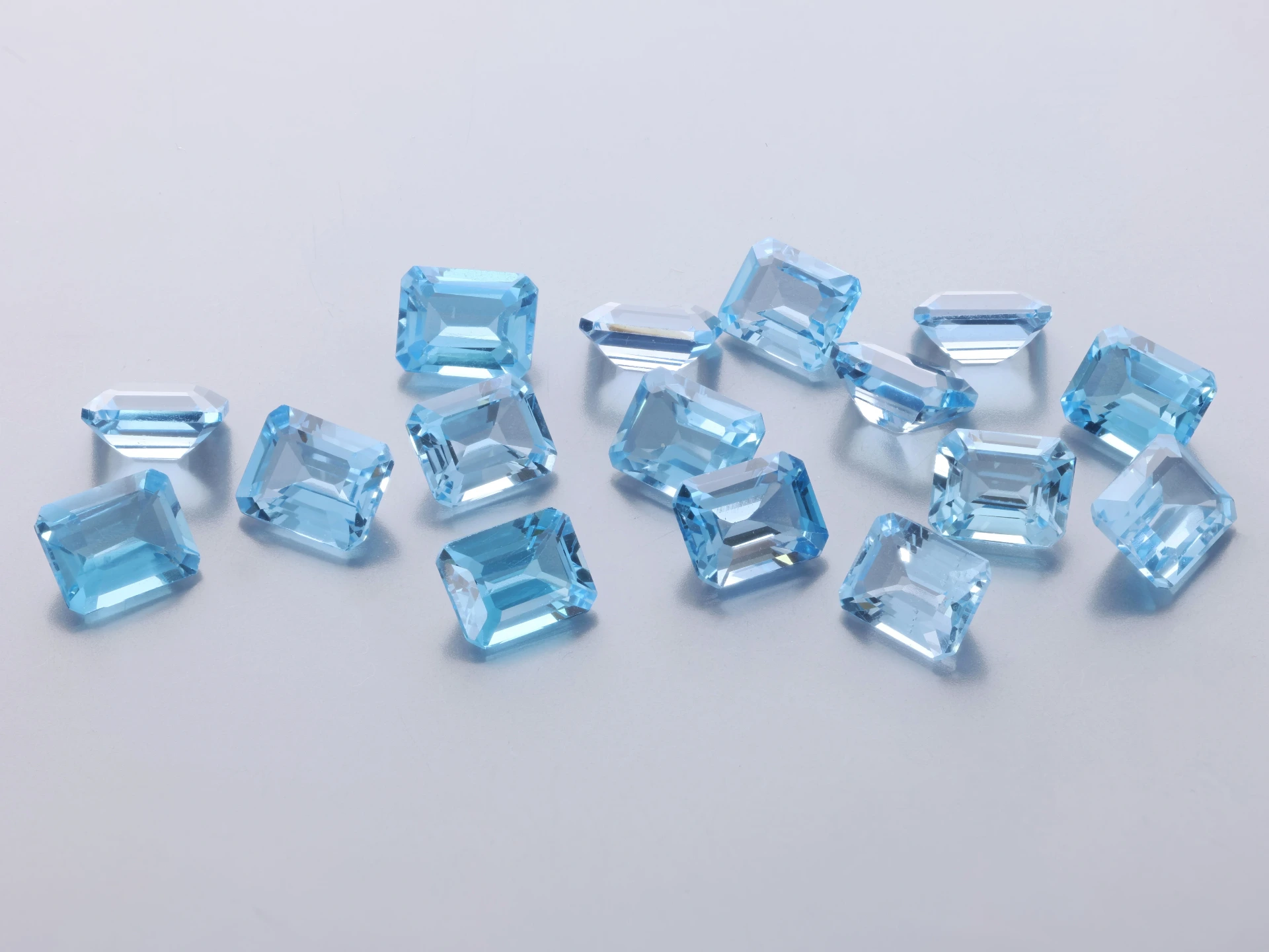 Topaz 5x4mm Emerald Cut Medium Blue