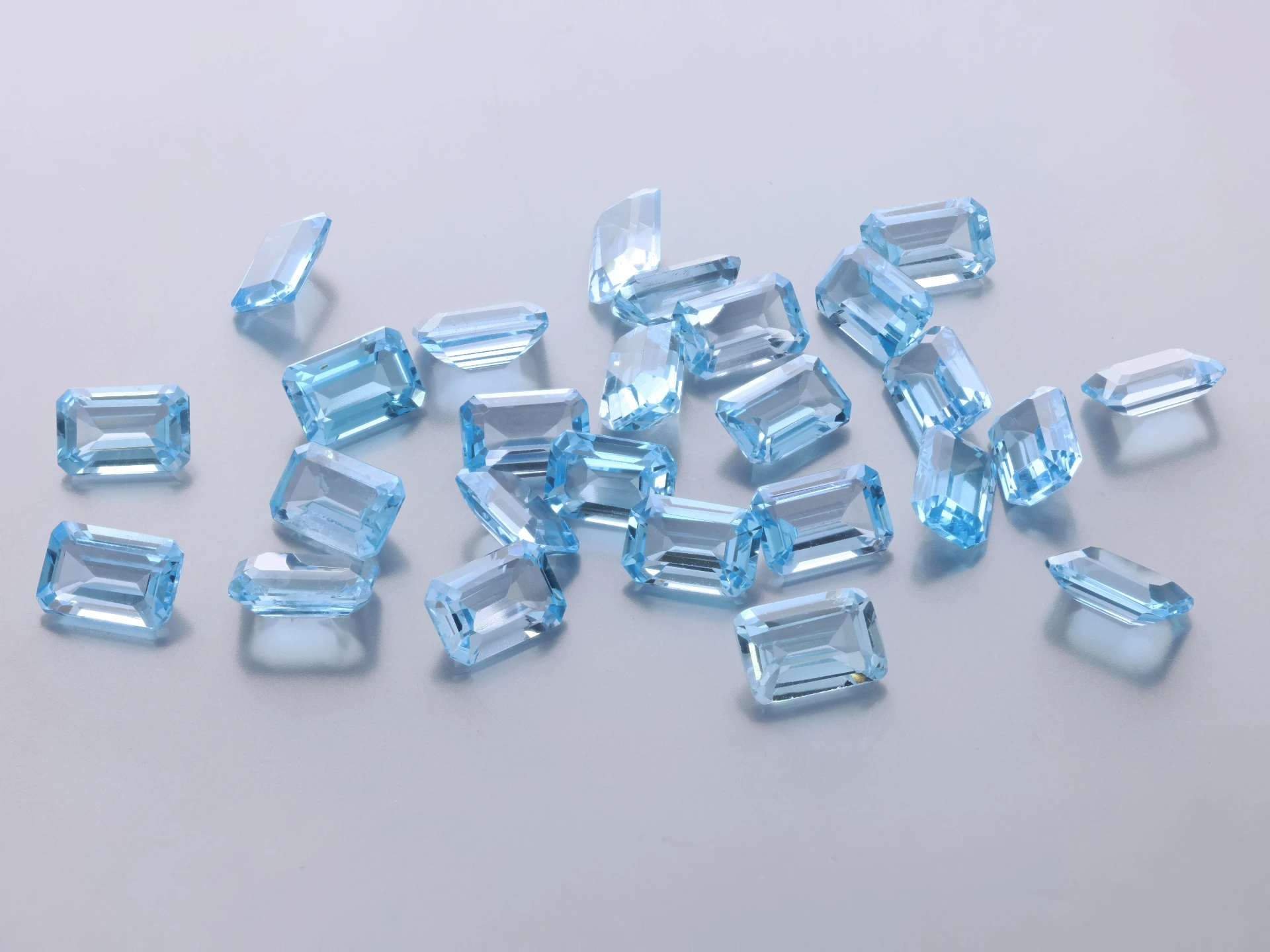 Topaz 6x4mm Emerald Cut Medium Blue