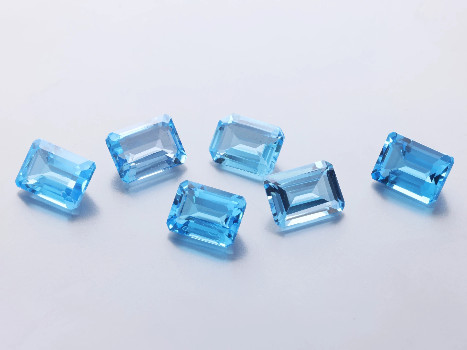 Topaz 8x6mm Emerald Cut Medium Blue