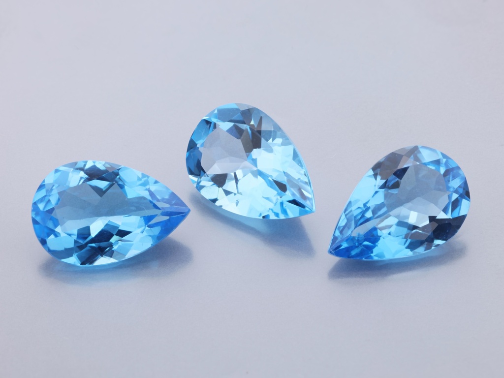 Topaz 12x8mm Pear Shape Medium Blue 