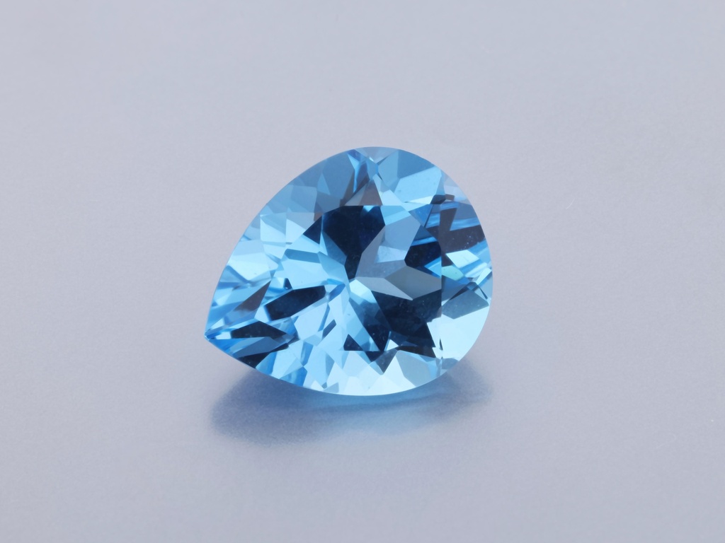Topaz 12x10mm Pear Shape Medium Blue 