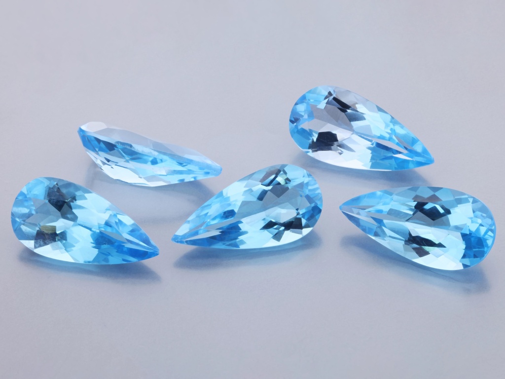 Topaz 14x7mm Pear Shape Medium Blue 