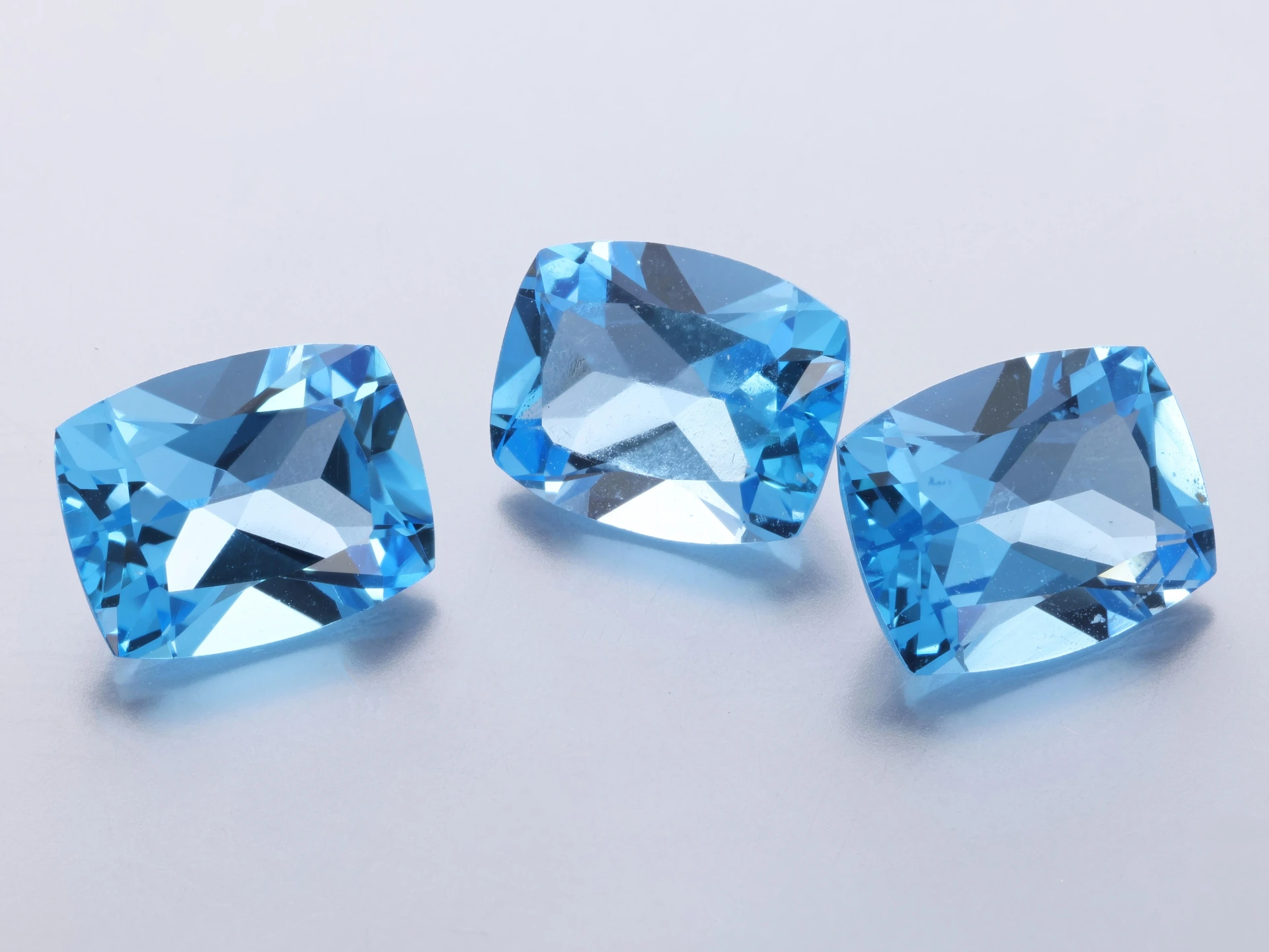 Topaz 10x8mm Cushion Medium Blue