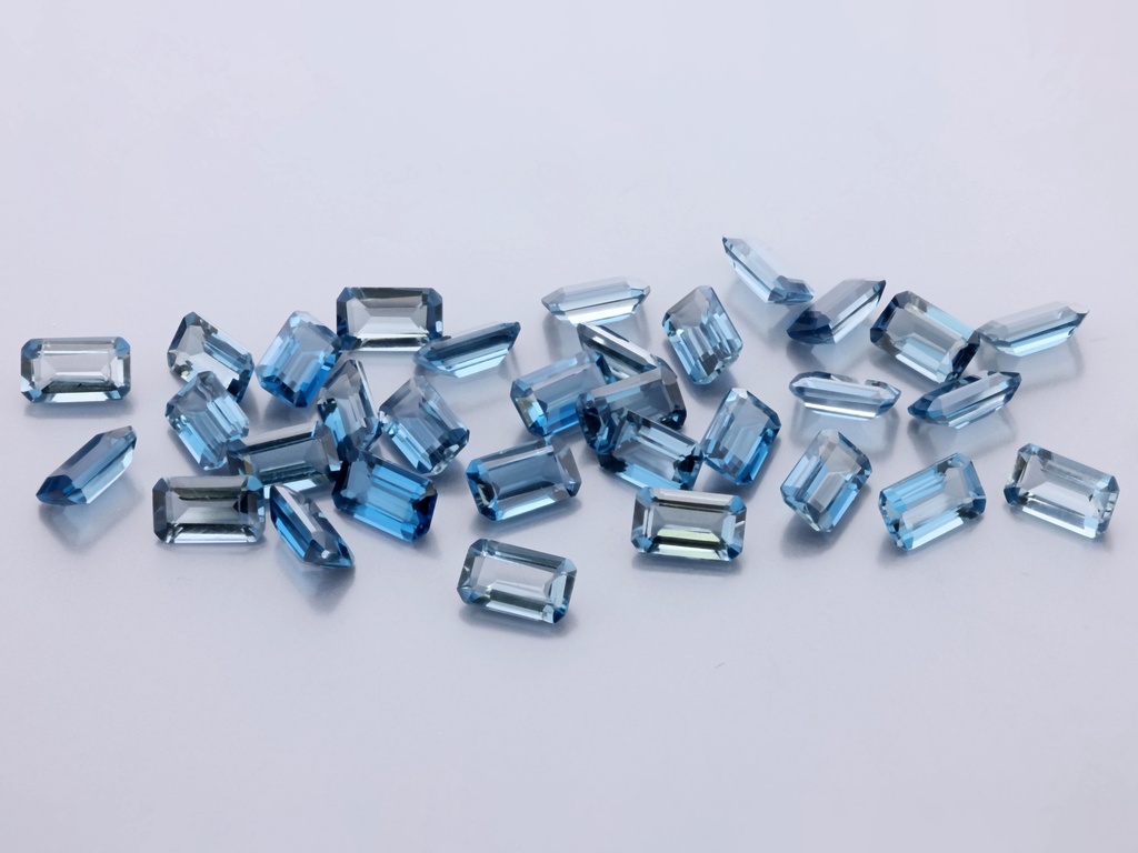 London Blue Topaz 5x3mm Emerald Cut