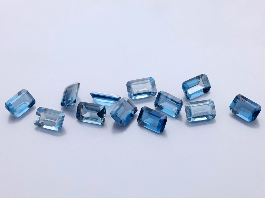 London Blue Topaz 6x4mm Emerald Cut