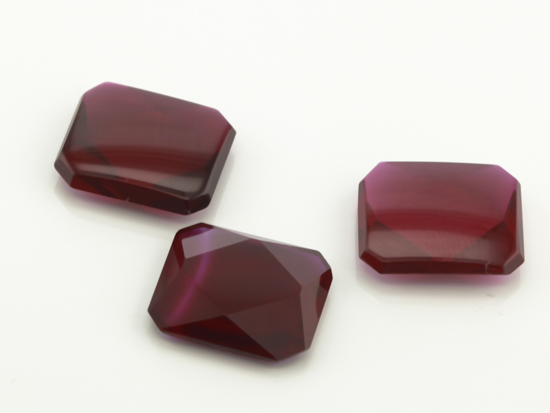 [RSDEB-1210] Synthetic/Lab Grown Ruby 12x10mm Emerald Cut Buff Top Dark Red