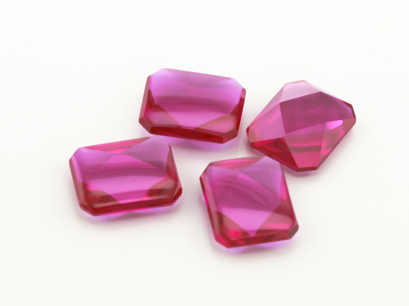 Synthetic/Lab Grown Ruby 11x9mm Emerald Cut Buff Top Faceted Back Bright Red
