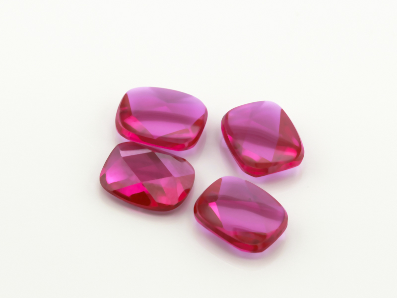 Synthetic/Lab Grown Ruby 12x10mm Cushion Buff Top Faceted Back Bright Red