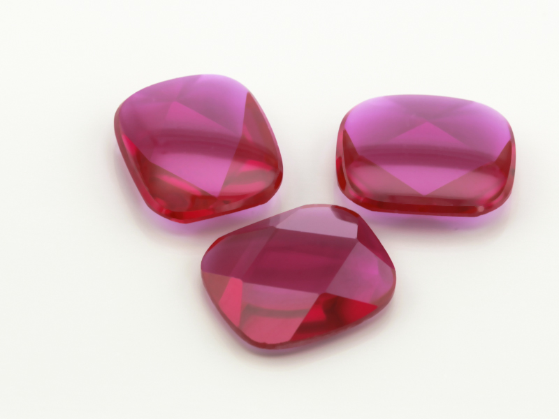 Synthetic/Lab Grown Ruby 14x12mm Cushion Buff Top Faceted Back Bright Red