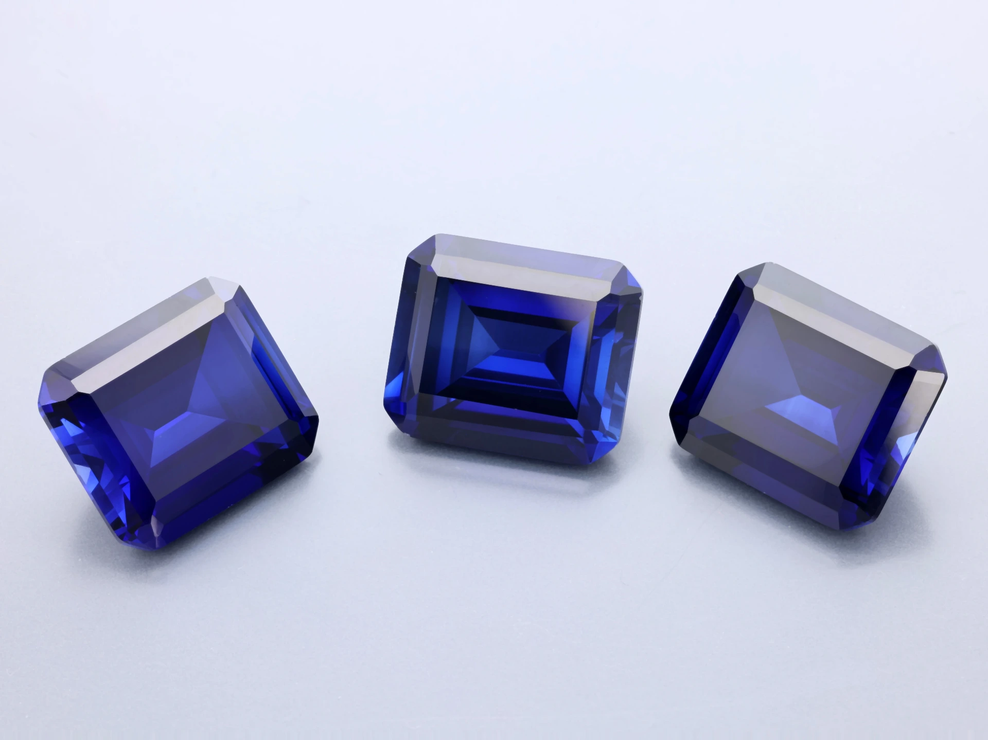 Synthetic/Lab Grown Sapphire 14x12mm Emerald Cut Blue