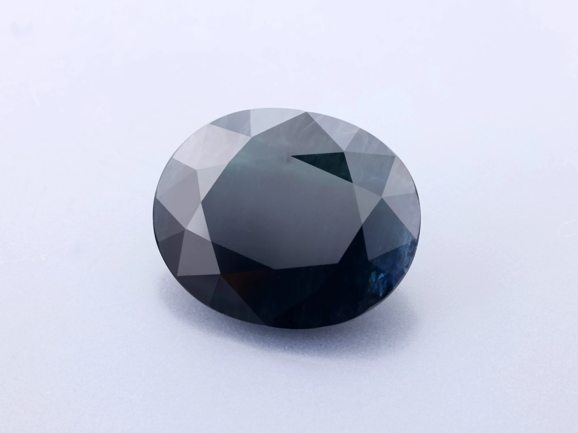 Sapphire 11.8x9.7mm Oval Blue Black