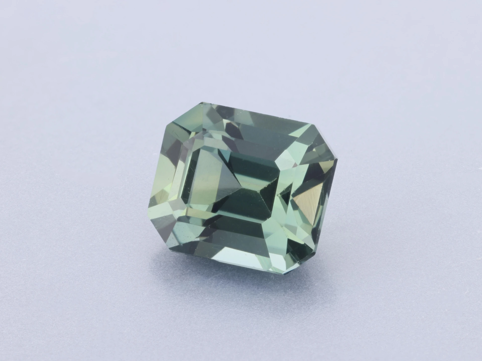 Sapphire 5.9x5.1mm Emerald Cut Green