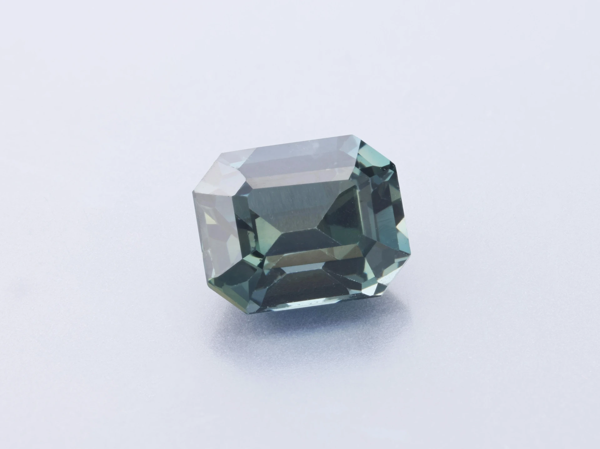Sapphire 6.25x5.05mm Emerald Cut Green