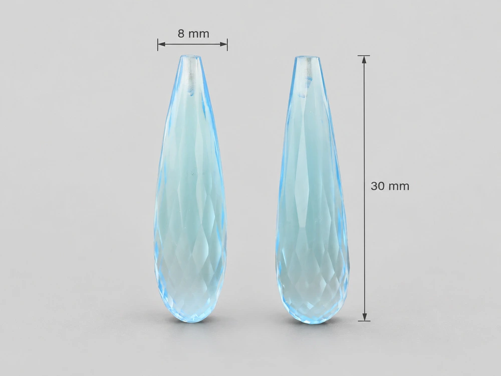 [TKDL3008P] Topaz 30x8mm Briolette Light Blue Pair