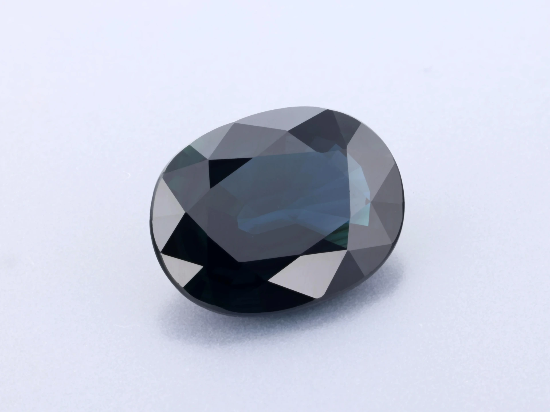 Australian Sapphire 8.95x6.85mm Oval Dark Blue