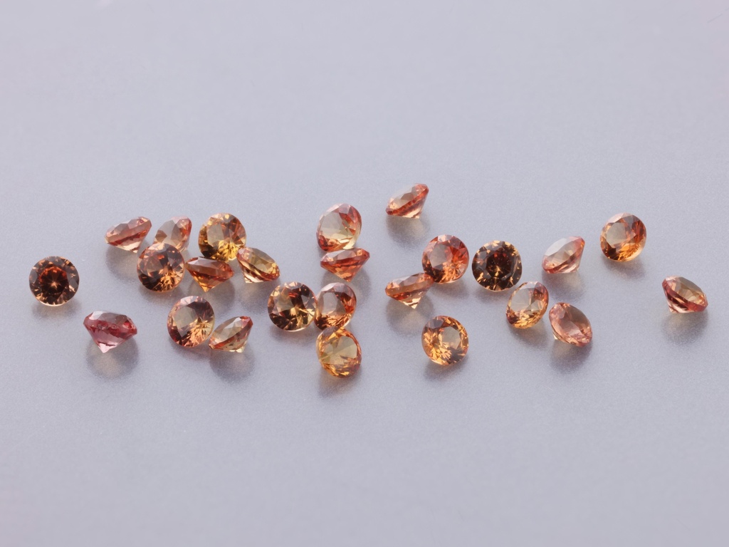 Orange Sapphire 1.50mm Round Beryllium Treated