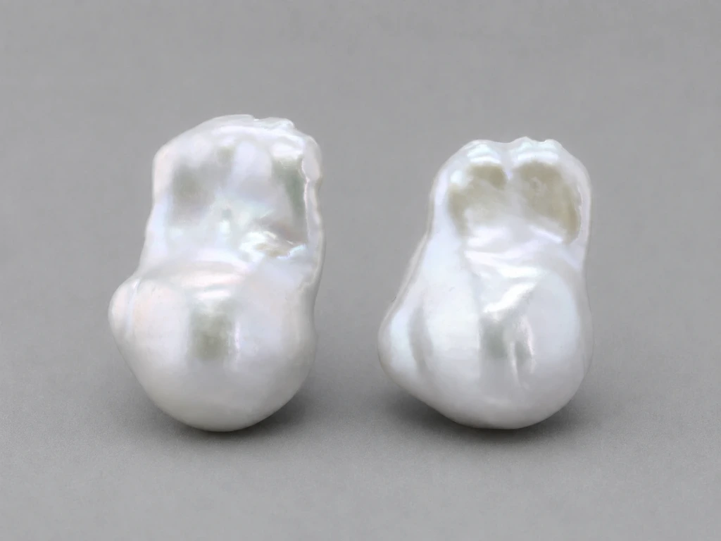 [JFUZ2015X5] Freshwater Pearl Baroque
20x14mm+/- Free Form Half
Drilled White PAIR