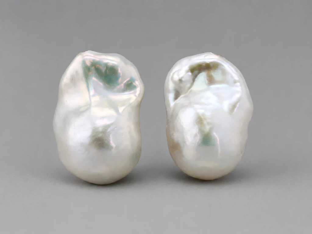 [JFUZ2015X14] Freshwater Pearl Baroque
20x14mm+/- Free Form Half
Drilled White PAIR