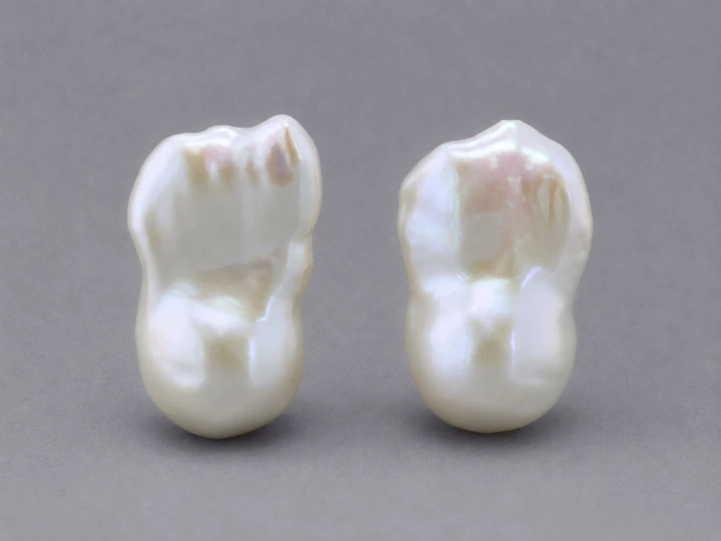 [JFUZ2015X15] Freshwater Pearl Baroque
20x14mm+/- Free Form Half
Drilled White PAIR