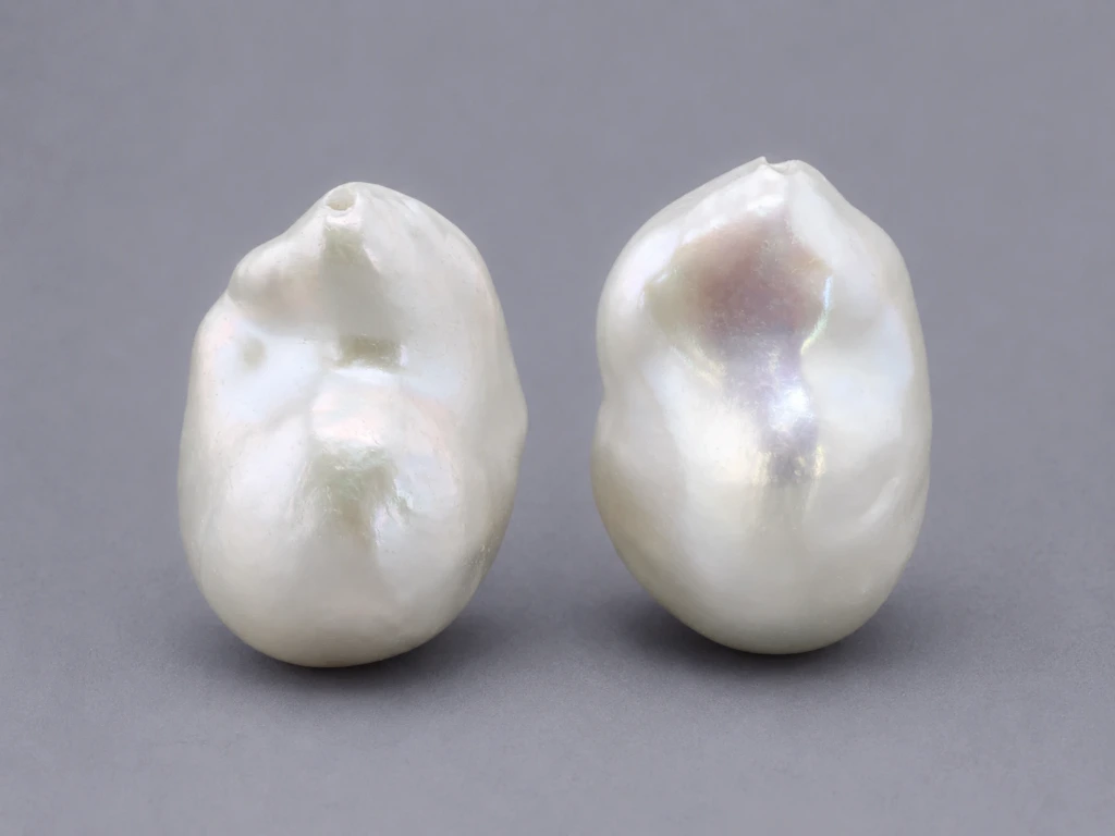 [JFUZ2015X19] Freshwater Pearl Baroque
20x14mm+/- Free Form Half
Drilled White PAIR