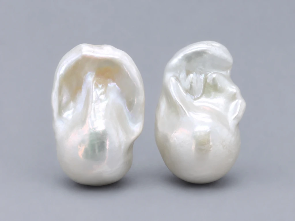 [JFUZ2518X3] Freshwater Pearl Baroque
25x18mm+/- Free Form Half
Drilled White PAIR