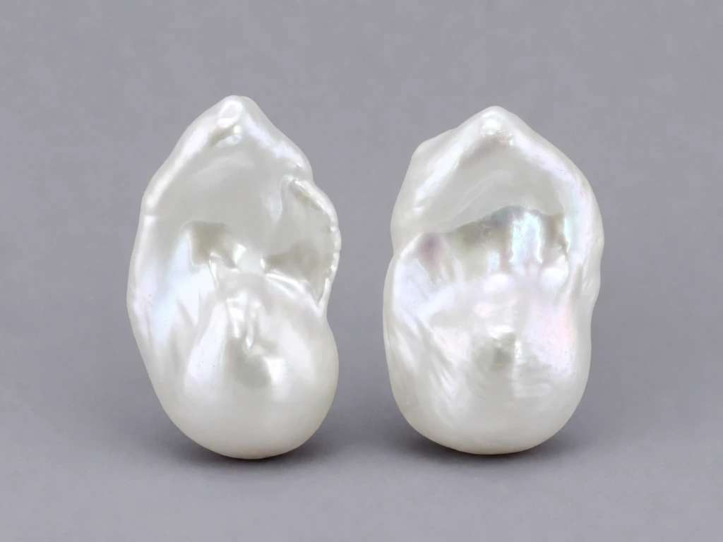 [JFUZ2518X9] Freshwater Pearl Baroque
25x18mm+/- Free Form Half
Drilled White PAIR