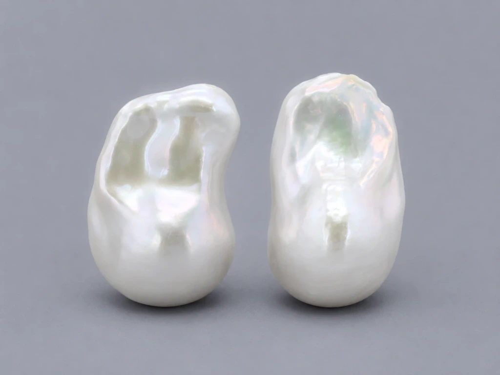 [JFUZ2518X10] Freshwater Pearl Baroque
25x18mm+/- Free Form Half
Drilled White PAIR