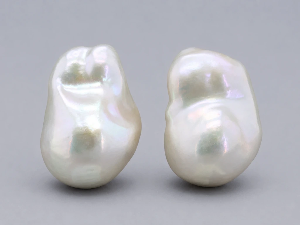 [JFUZ2518X11] Freshwater Pearl Baroque
25x18mm+/- Free Form Half
Drilled White PAIR