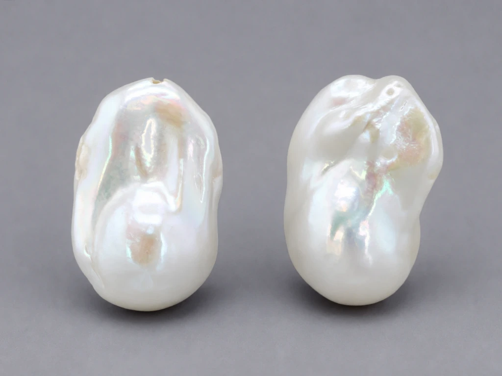 [JFUZ2518X12] Freshwater Pearl Baroque
25x18mm+/- Free Form Half
Drilled White PAIR
