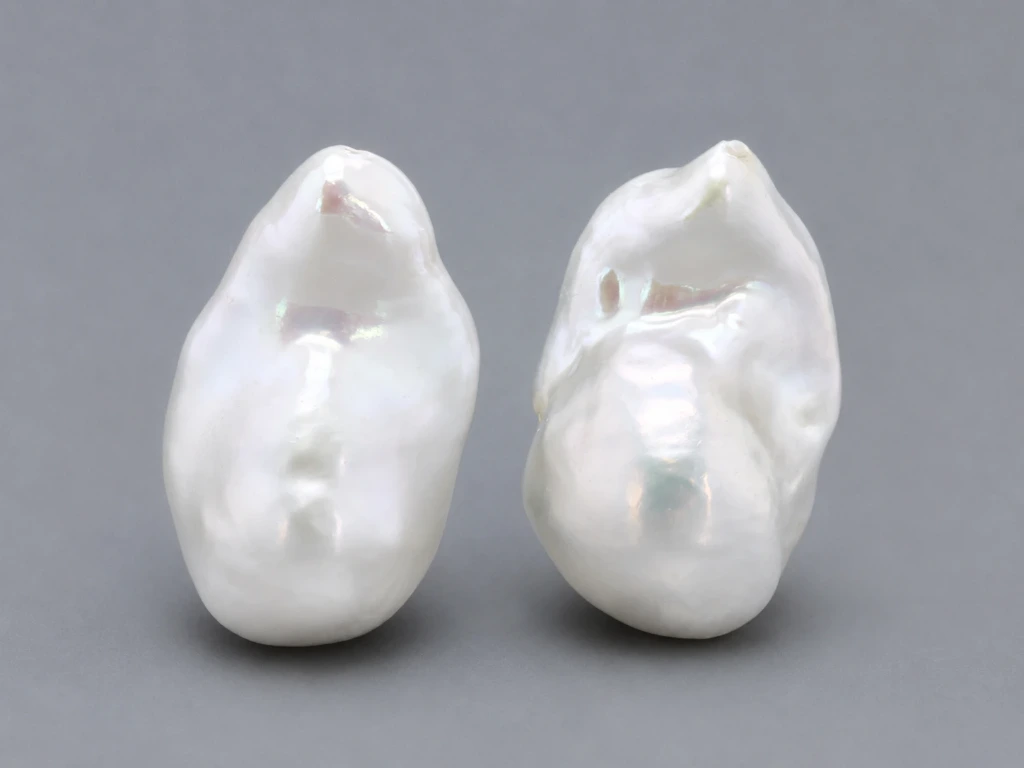 [JFUZ2518X13] Freshwater Pearl Baroque
25x18mm+/- Free Form Half
Drilled White PAIR