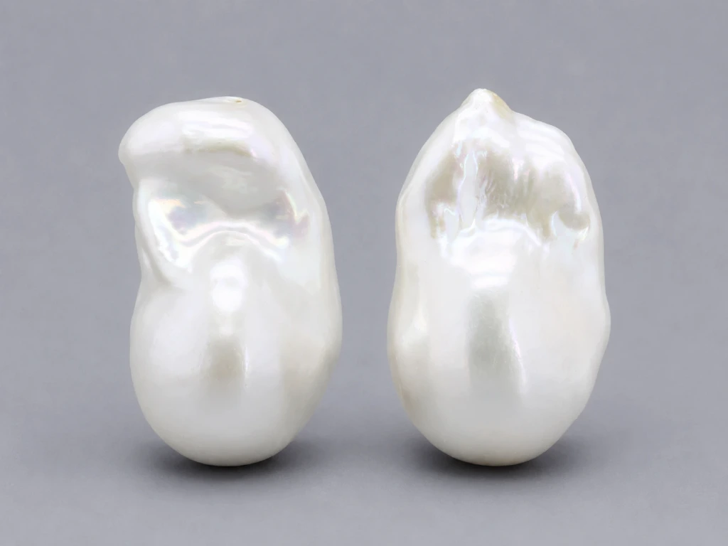 [JFUZ2518X17] Freshwater Pearl Baroque
25x18mm+/- Free Form Half
Drilled White PAIR
