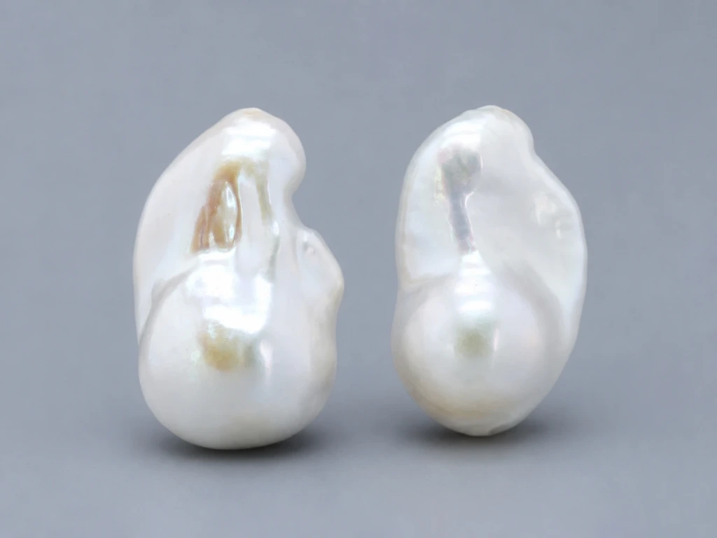 [JFUZ2518X18] Freshwater Pearl Baroque
25x18mm+/- Free Form Half
Drilled White PAIR